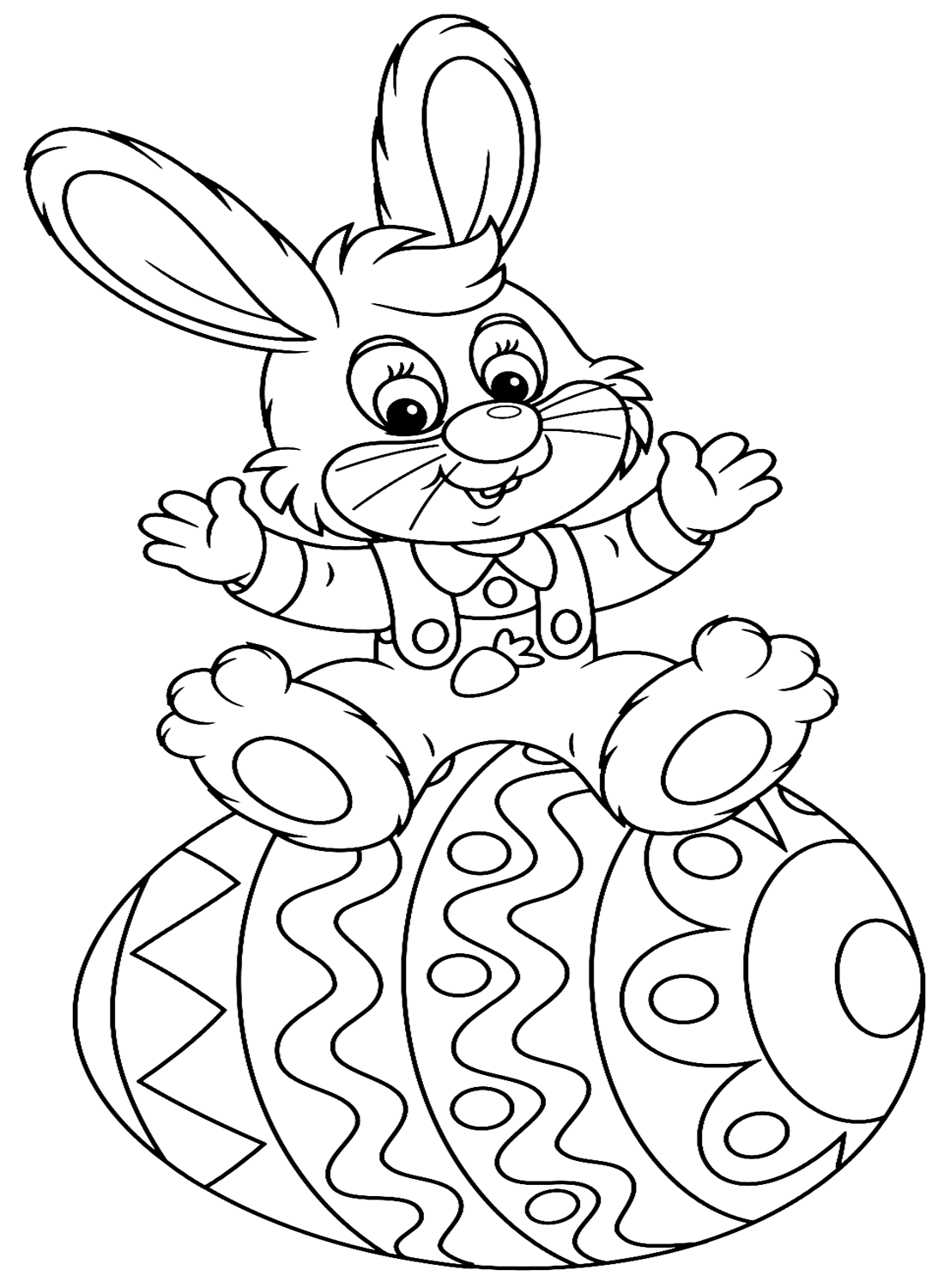 快乐的小兔子坐在兔子的复活节彩蛋上
